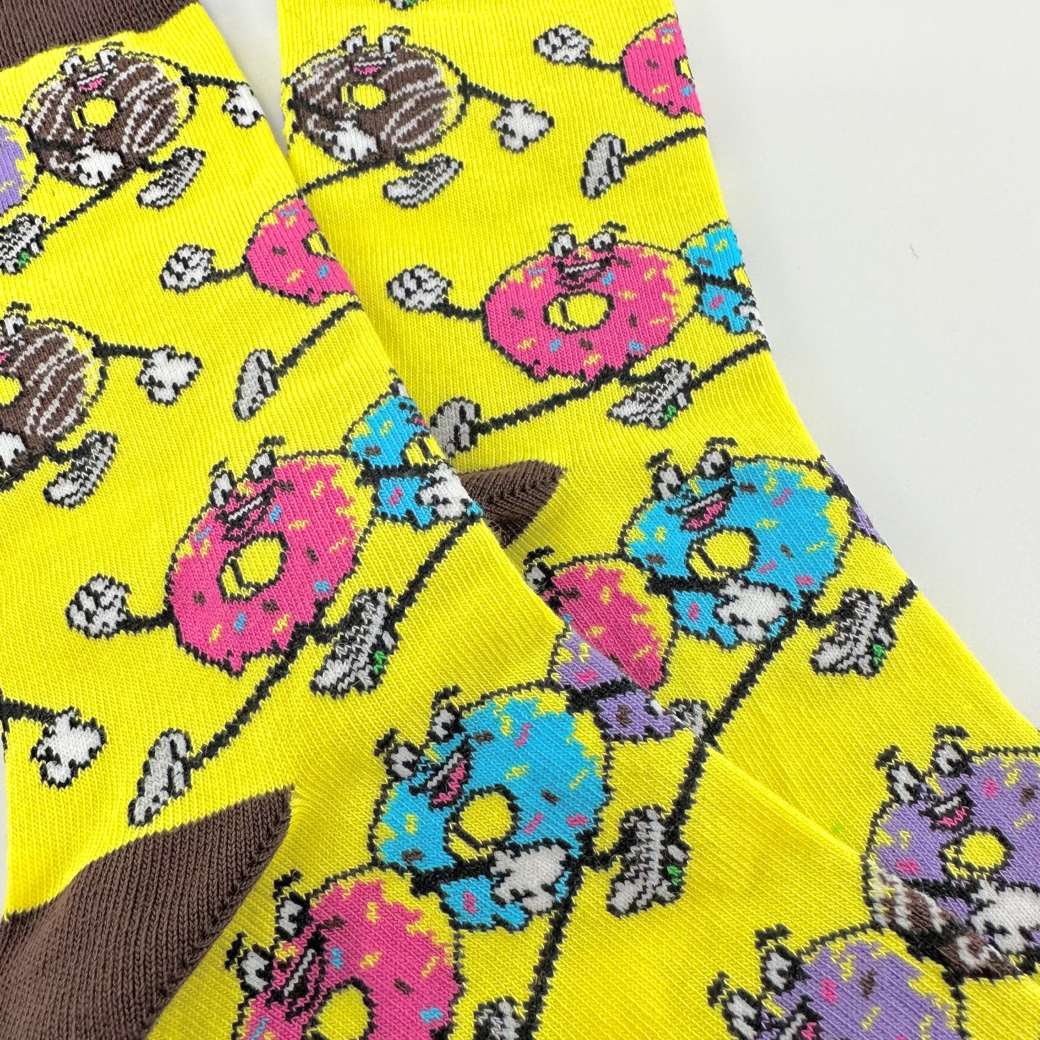 Marching Donuts Socks from the Sock Panda (Adult Small)