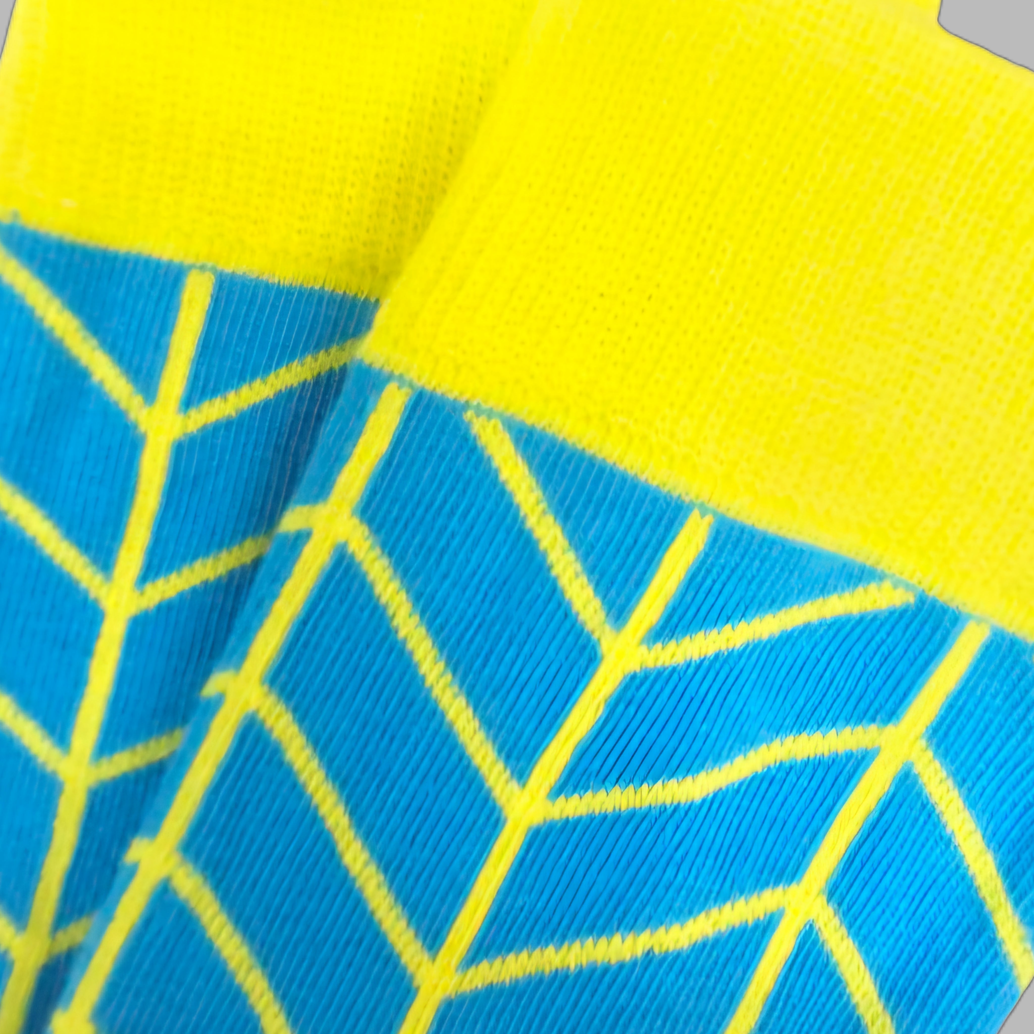 Vibrant Turquoise and Yellow Patterned Sock from the Sock Panda (Adult Large - Men's Shoe Sizes 8-12)