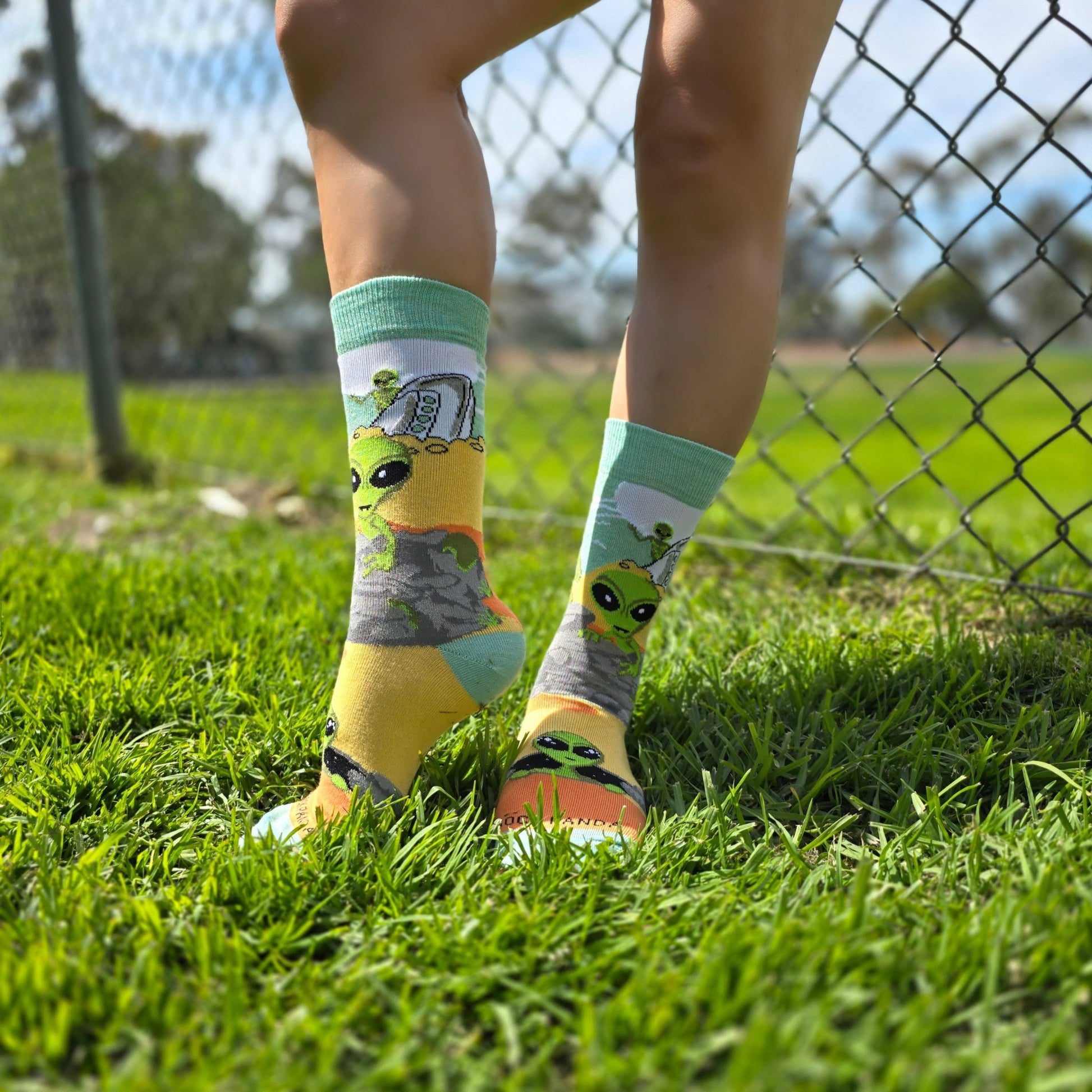 Alien Desert Crash Landing Socks from the Sock Panda