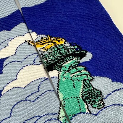 Lady Liberty Rises Above the Clouds Socks from the Sock Panda
