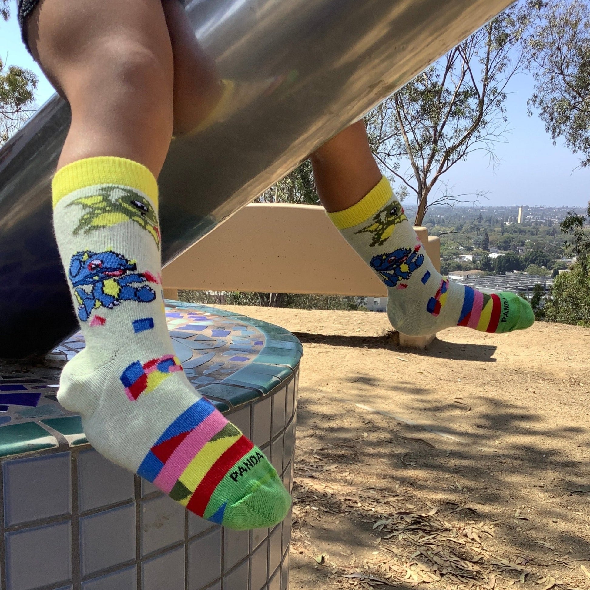 Trio Playful Baby Dinosaurs Socks (Ages 3 - 7) from the Sock Panda